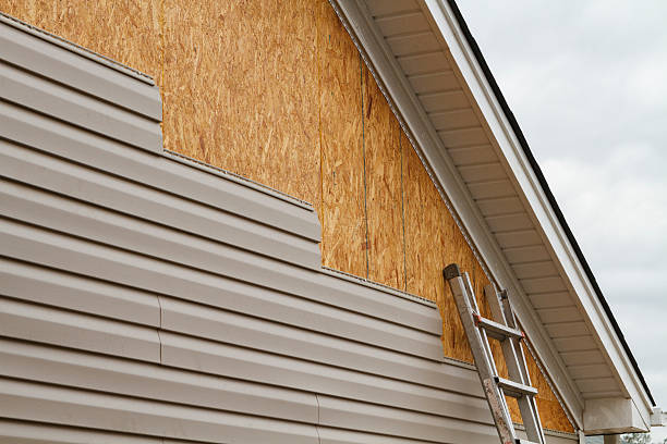 Professional Siding technician working in Ford Cliff, PA